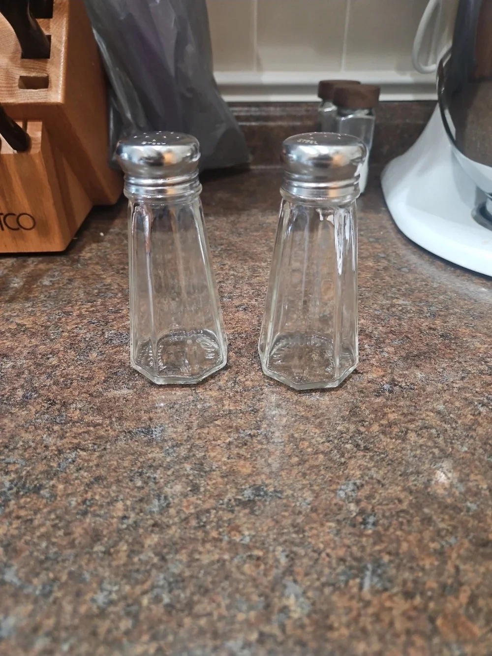 Clear Glass Salt and Pepper Shakers with Silver Tops